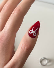 Load image into Gallery viewer, Hand-Painted Christmas bow Almond Shaped Nails with Sticky Tabs &amp; Kit A095