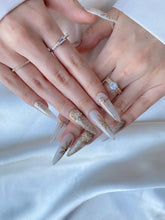 Load image into Gallery viewer, Hand-Painted Elf Wink Stiletto Nails with Sticky Tabs &amp; Kit Y083